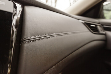 Leather background. Modern business car interior detail.