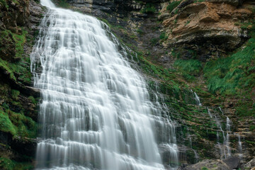 Cola de Caballo waterfall under Monte Perdido in the Ordesa Valley, Pyrenees of Spain.