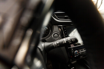 Car steering wheel. vehicle interior. Interior view of car with black salon.