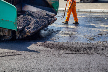Spread hot asphalt
