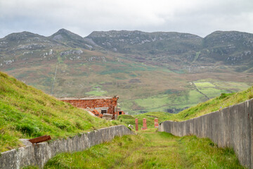 Naklejka premium The ruins of Lenan Head fort at the north coast of County Donegal, Ireland.