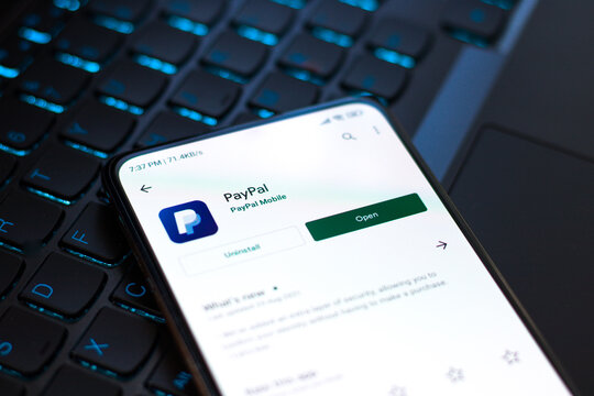 West Bangal, India - September 21, 2021 : Paypal logo on phone screen stock image.