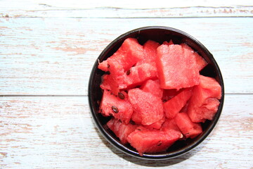 Watermelon / tarbooj fruit cube slices served in a bowl. selective focus