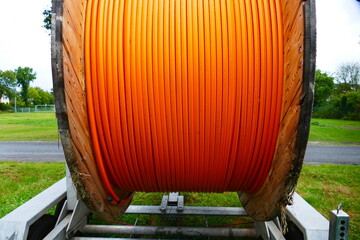 Fiber optic cable roll for digital broadband internet communication.