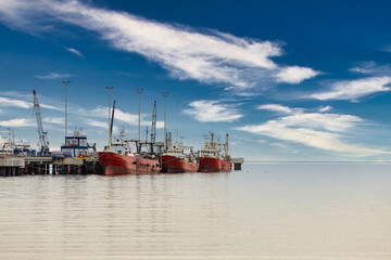 Boats moored at the pier of Puerto Madryn, Argentina