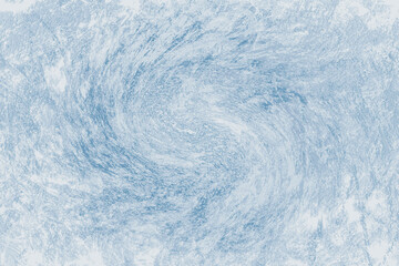 Blue snow background with swirls. Abstract winter wallpaper. A whirlwind of snow, a winter wind.