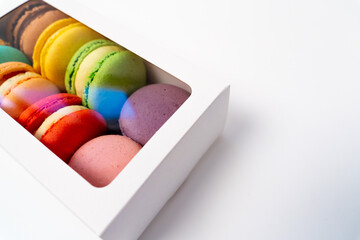 Macaroons in a package. colorful French macaroons. Gift for March 8, Valentine's Day.