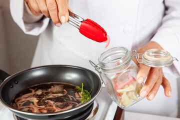 Close-up of the process of preparation of homemade pickles