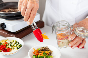 Close-up of the process of preparation of homemade pickles