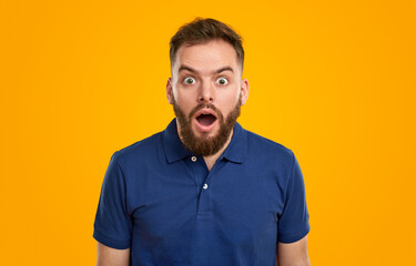 Amazed bearded man with mouth opened