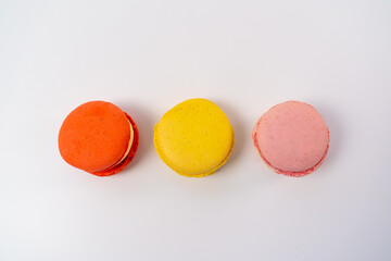 Macaroons on a white background, colorful macaroons french cookies. Macaroons. Gift for March 8th. Valentine's Day