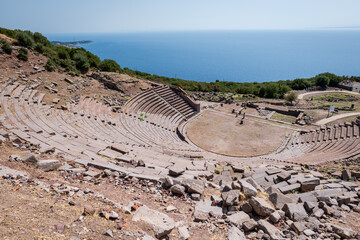 Assos theater, ancient Greek archeological site,  overlooking the Aegean Sea. Assos is famous for...