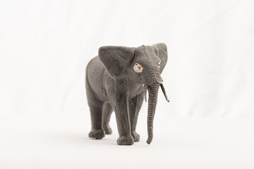 Gothenburg, Sweden - september 11 2021: Plastic toy elephant on white background.