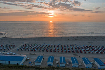 Aerial from beach houses at the beach at Katwijk aan Zee in the Netherlands at sunset