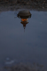 lighthouse reflection in water