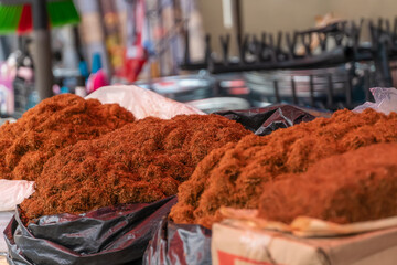 Close-up of tobacco bags on the market