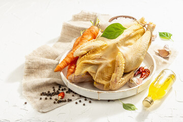 Whole free-range chicken poultry. Organic farm food, trendy hard light, dark shadow