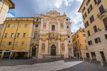 Fototapeta na wymiar The facade of the Church of Santa Maria Maddalena in Rome, Italy.