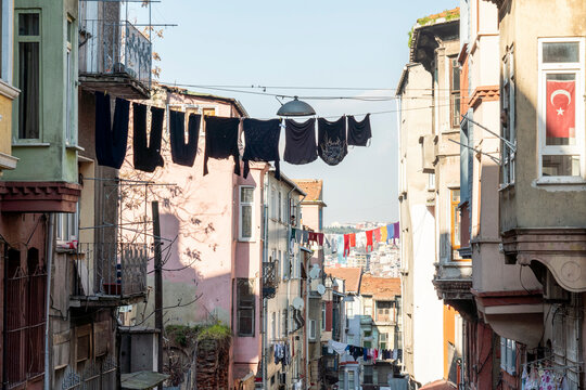 Turkey, Istanbul, Laundry drying between houses in Balat district