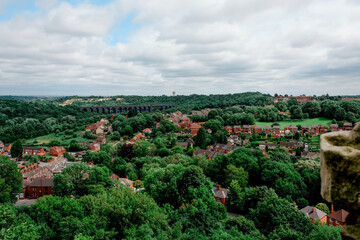 An ordinary English town among the trees on a summer day top view