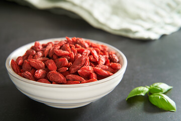 Close up of a bowl of goji berries. 