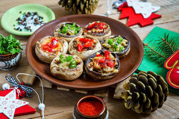 stuffed mushrooms with Christmas decoration around