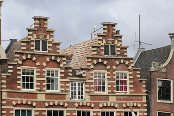 Amsterdam Historic House Facades with Decorated Stepped Gables Close Up at Nieuwmarkt Square, Netherlands