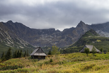 Huts in mountain valley PL