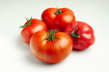 Four large ripe red tomatoes