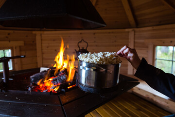 Cooking popcorn on a fire in Norway