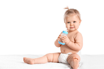 Cute baby girl with bottle of water on white background