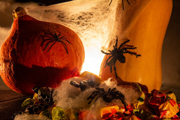 Halloween decorations with pumpkins and spiders
