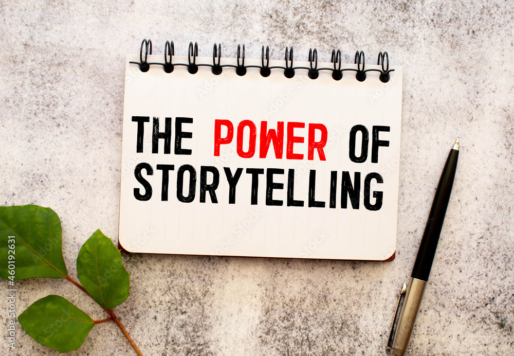 Poster business concept. notebook with text the power of storytelling sheet of white paper for notes.