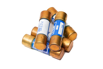 5 large 50 Amp electric fuses on white background
