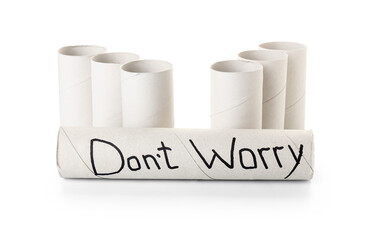 Toilet paper tubes with text DON'T WORRY on white background