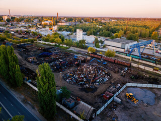 Metal recycling industry. Drone aerial view of scrap yard - obrazy, fototapety, plakaty