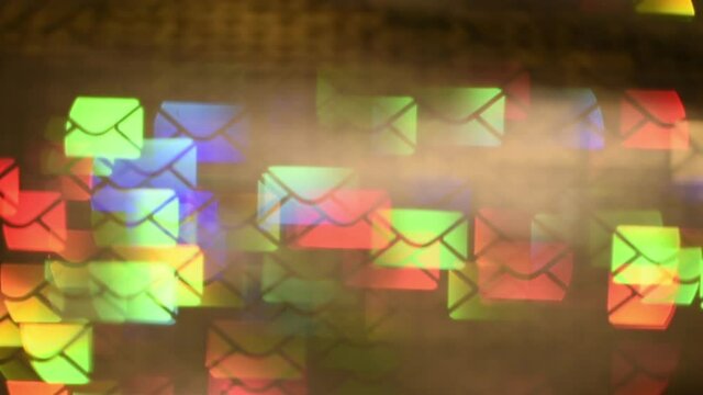 Moving Rainbow Envelope-shaped bokeh. Global social media connect concept. Movement of Cyber Messages. Can be used as background or overlay. Light Leaks.