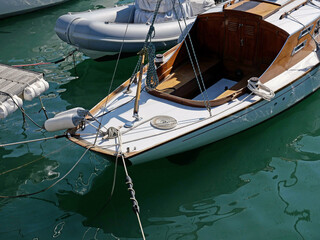 Wooden sailboat moored in the harbor