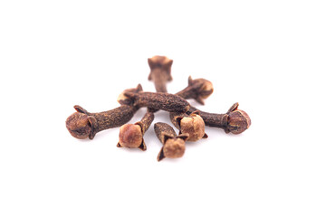 dry cloves on white background