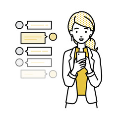 立ってスマートフォンで楽しくチャットで会話するジャケットの女性