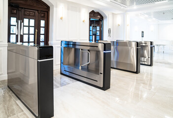 entrance and turnstile with face recognition and body temperature measurement.