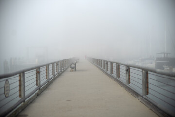 pedestrian pier in the fog