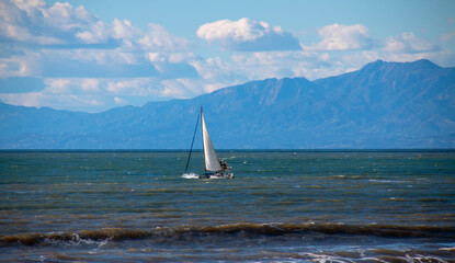 Fototapeta na wymiar Sailboat in the Pacific Ocean near Ventura California United States