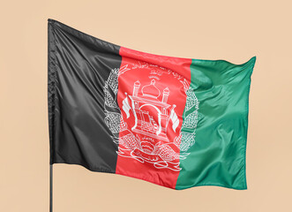 Waving flag of Afghanistan on beige background