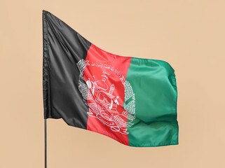 Waving flag of Afghanistan on beige background