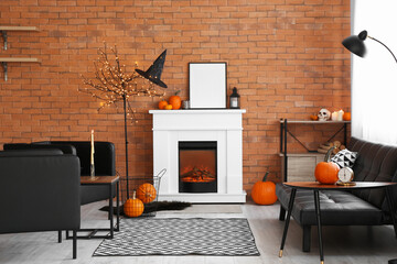 Fireplace with frame in living room decorated for Halloween