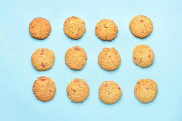 Delicious cranberry cookies on blue background