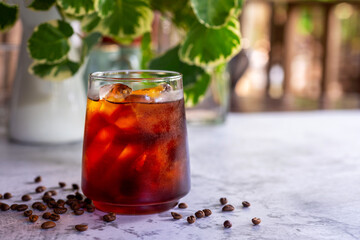 a glass of cold brew coffee with ice