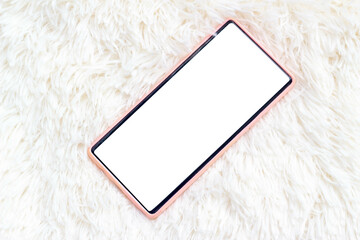 smart phone in pink case with blank screen
