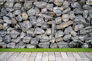 Fragment of a wall from a chipped stone. A Rock Mineral Product Display Shelf